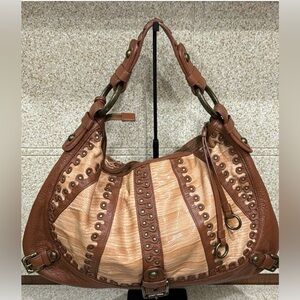 Studded leather handbag Isabella Fiore excellent craftsmanship